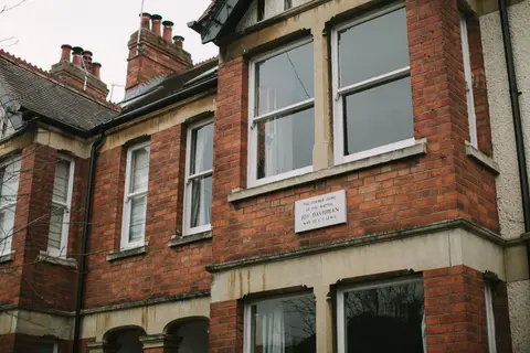 Exterior of a historic brick house in Oxford, former home of writer Joy Davidman.